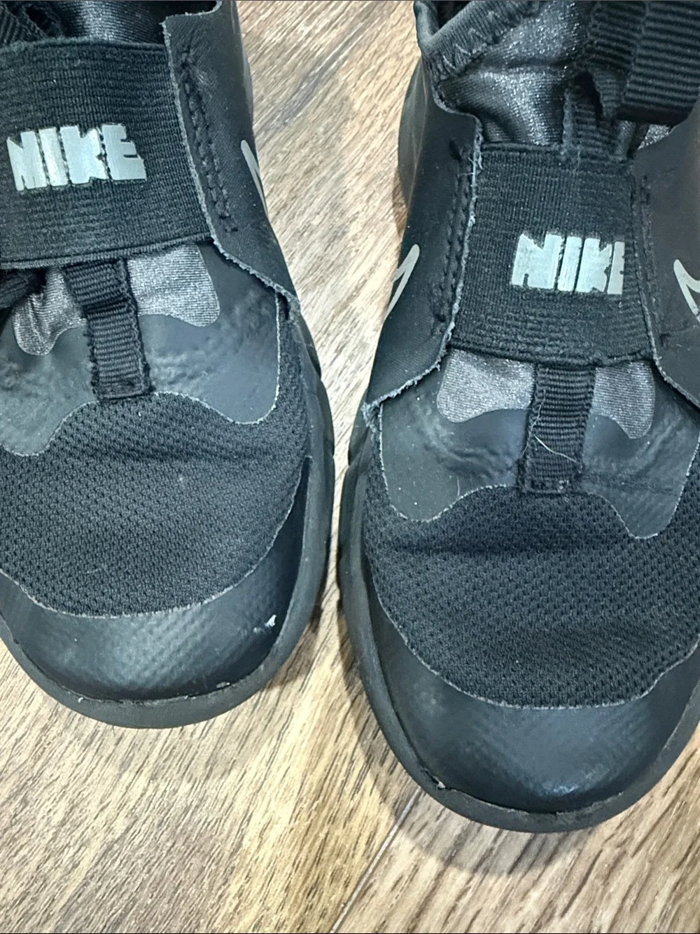 Nike Kids Black Slip-On Sneakers with Reflective Swoosh